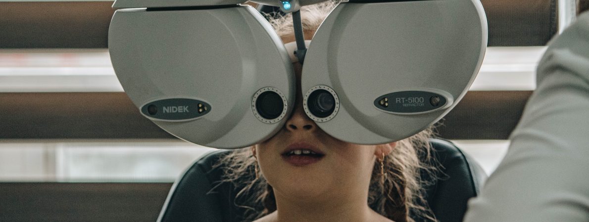 A young person having an eye test