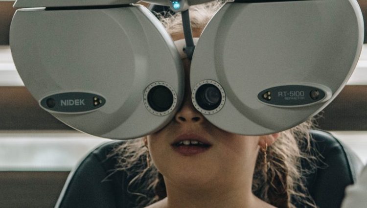 A young person having an eye test