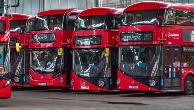 Row of London buses at a station