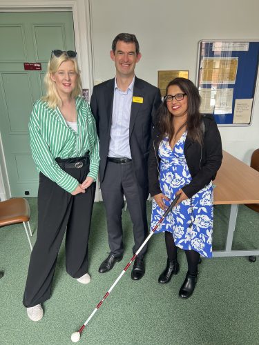 Picture shows Senior Engagement Manager at TPT, Louise Connop standing alongside Birmingham Community Healthcare's Richard and Meena. Meena is holding a white cane.